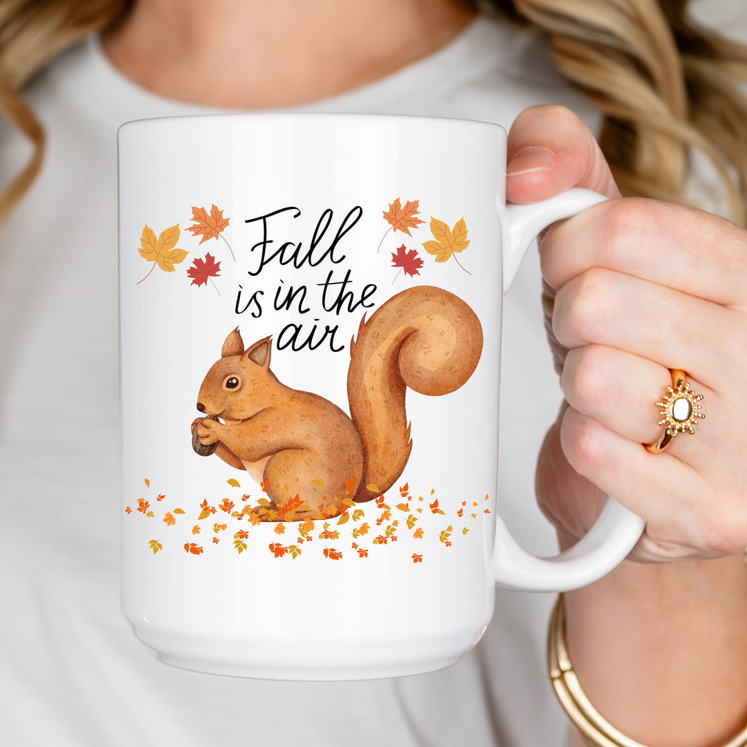 Squirrel Fall Is In The Air Coffee Mug