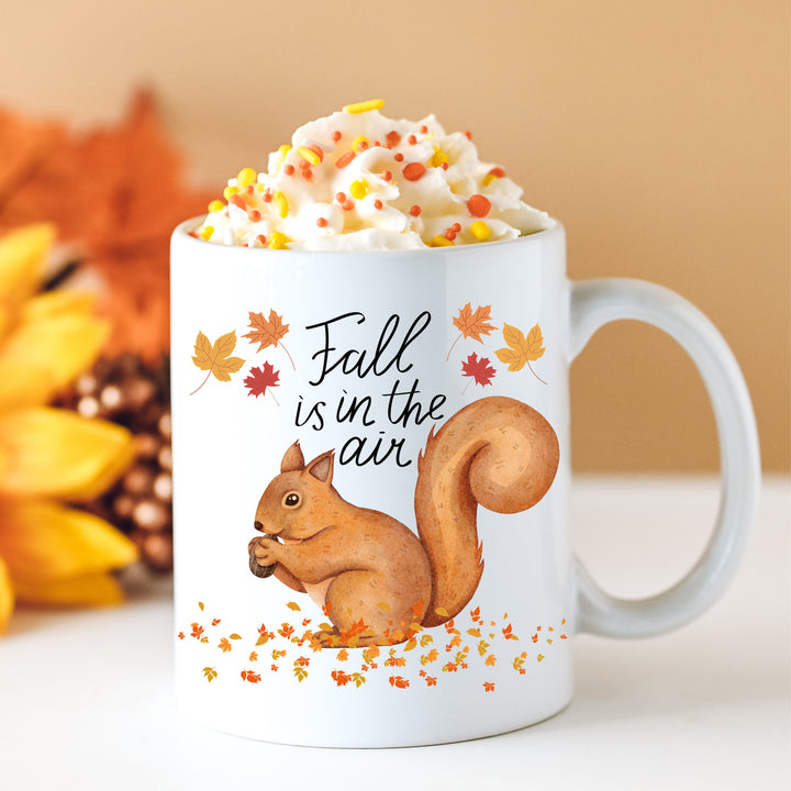 Squirrel Fall Is In The Air Coffee Mug