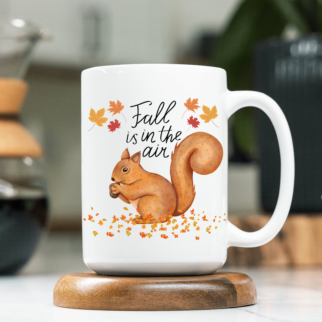 Squirrel Fall Is In The Air Coffee Mug